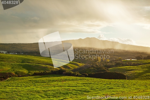 Image of Green landscape with coming rain