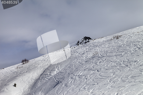 Image of Off-piste slope in gray day