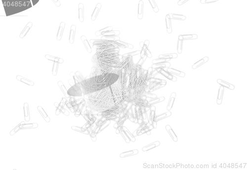 Image of many paperclips on desk