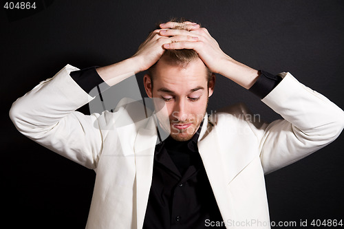 Image of Stressed businessman