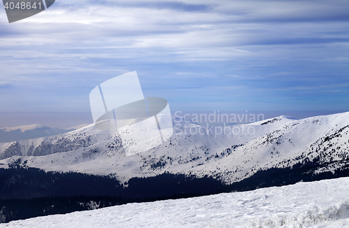 Image of Winter mountains and cloudy sky