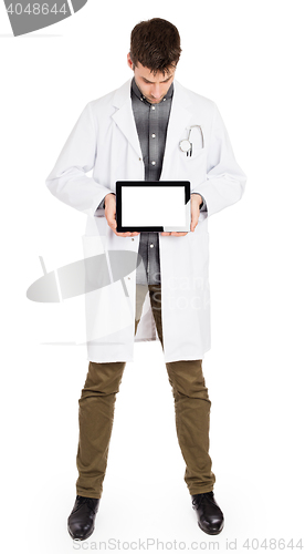 Image of Doctor holding tablet with copy space and clipping path for the 