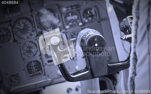 Image of Center console and throttles in airplane