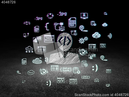 Image of Software concept: Programmer in grunge dark room