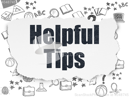 Image of Education concept: Helpful Tips on Torn Paper background