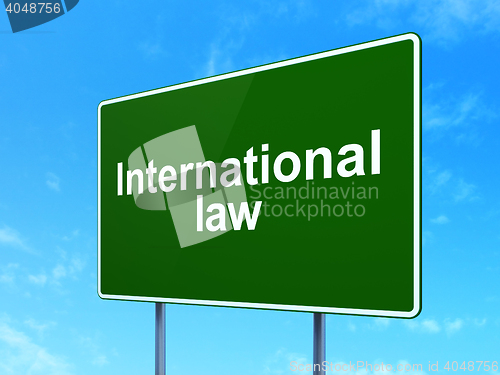 Image of Politics concept: International Law on road sign background