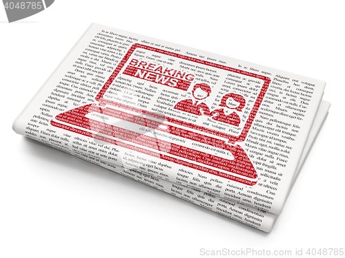 Image of News concept: Breaking News On Laptop on Newspaper background