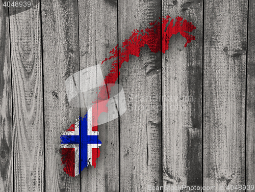 Image of Map and flag of Norway on wood