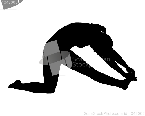 Image of Silhouette of woman doing yoga