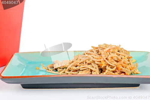 Image of Meat, noodles and red take away container