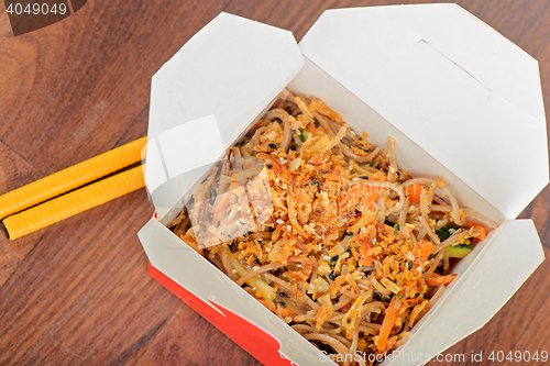 Image of Meat and noodles in take away container