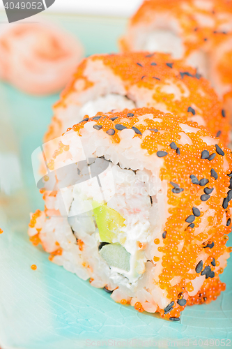 Image of California maki sushi with masago and ginger