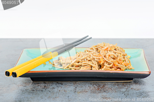 Image of China noodles with vegetables and meat