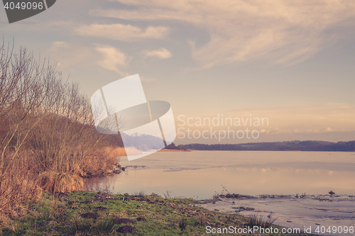 Image of Frozen lake scenery in the sunset