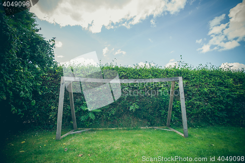 Image of Backyard soccer goal on a green lawn
