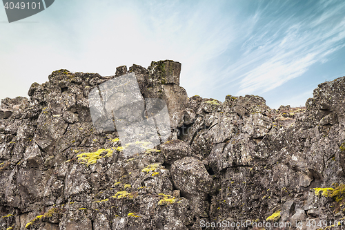 Image of Rough cliffs with green moss
