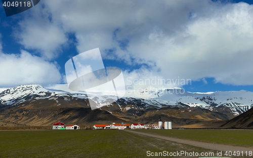 Image of Farm house near mountain