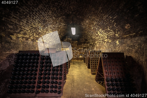 Image of Long underground brick tunnel in the wine cellar