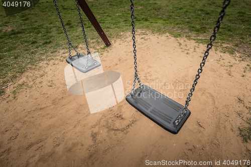 Image of Playground swing in the park