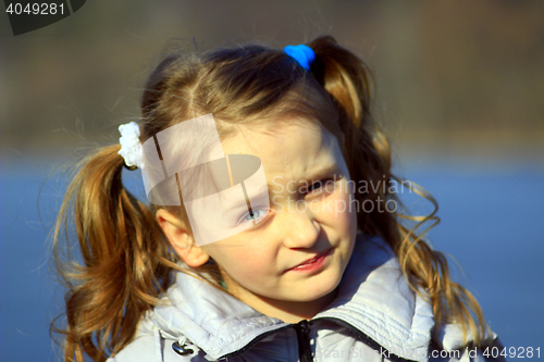 Image of portrait of young girl with nice braids