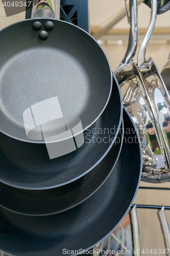 Image of new modern pots and pans close-up