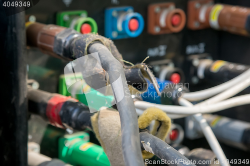 Image of electrical power cables connected to a temporary outdoors distribution station