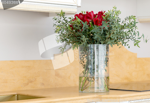 Image of beautiful flower arrangement in clear glass vase