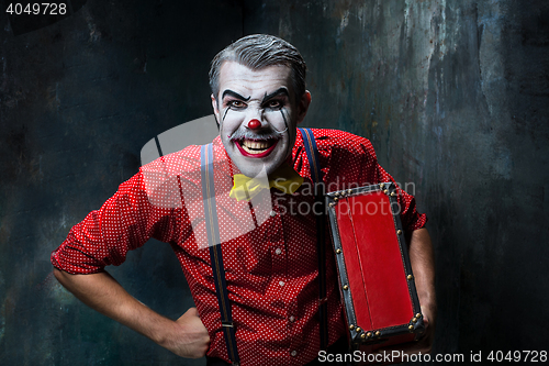 Image of Terrible crazy clown and Halloween theme