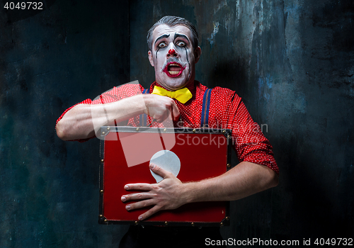 Image of Terrible crazy clown and Halloween theme