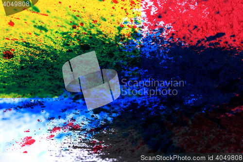 Image of cmyk toner powder (cyan, magenta, yellow, black)