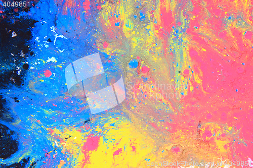 Image of cmyk toner powder (cyan, magenta, yellow, black)