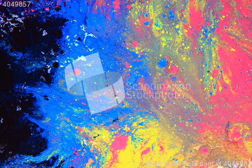 Image of cmyk toner powder (cyan, magenta, yellow, black)