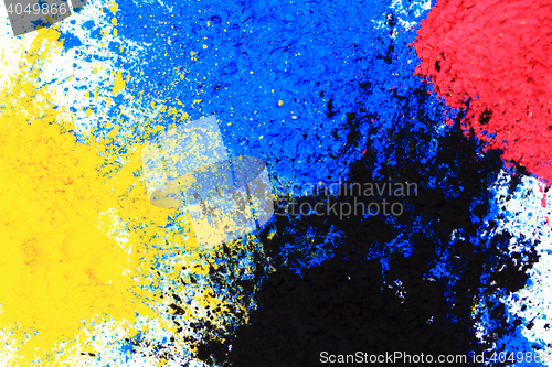 Image of cmyk toner powder (cyan, magenta, yellow, black)