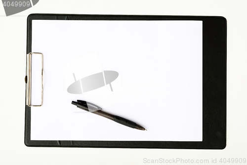 Image of Black clipboard with a pen isolated