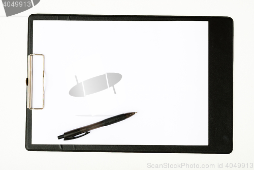 Image of Black clipboard with a pen isolated