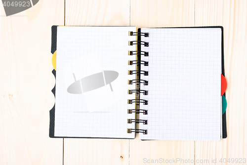 Image of notepad with pen isolated