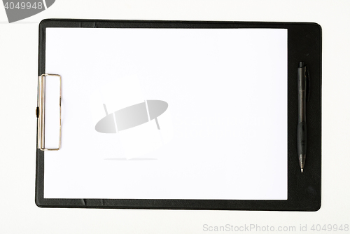 Image of Black clipboard with a pen isolated