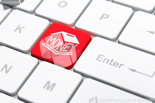 Image of Banking concept: Money Box on computer keyboard background