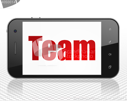 Image of Finance concept: Smartphone with Team on display