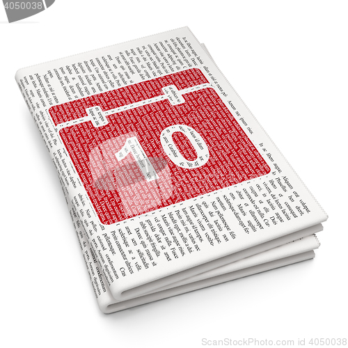 Image of Time concept: Calendar on Newspaper background
