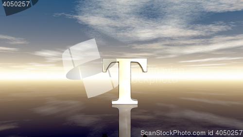 Image of metal uppercase letter t under cloudy sky - 3d rendering