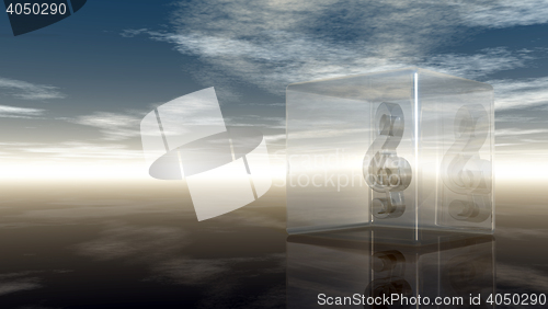 Image of clef in glass cube under cloudy sky - 3d rendering