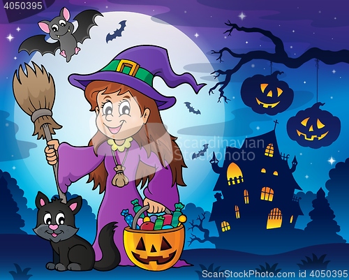 Image of Cute witch and cat in Halloween scenery
