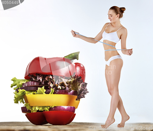 Image of Young healthy woman with vegetables. Collage