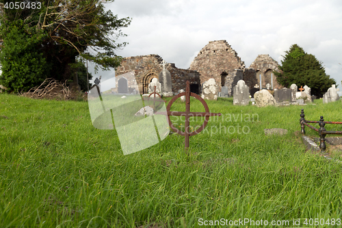 Image of old grave cross on celtic cemetery in ireland