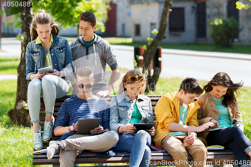 Image of group of students with tablet pc at school yard