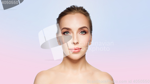 Image of beautiful young woman face over white background