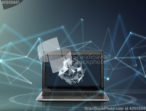 Image of laptop with low poly shape on screen 