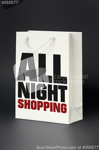 Image of white shopping bag all night shopping