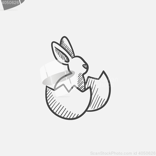 Image of Easter bunny sitting in egg shell sketch icon.